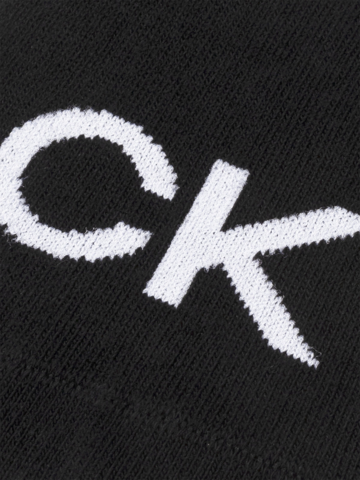 Calvin Klein Men&#39;s Footie High Cut Logo Socks 3 Pack in Black - Logo Close Up