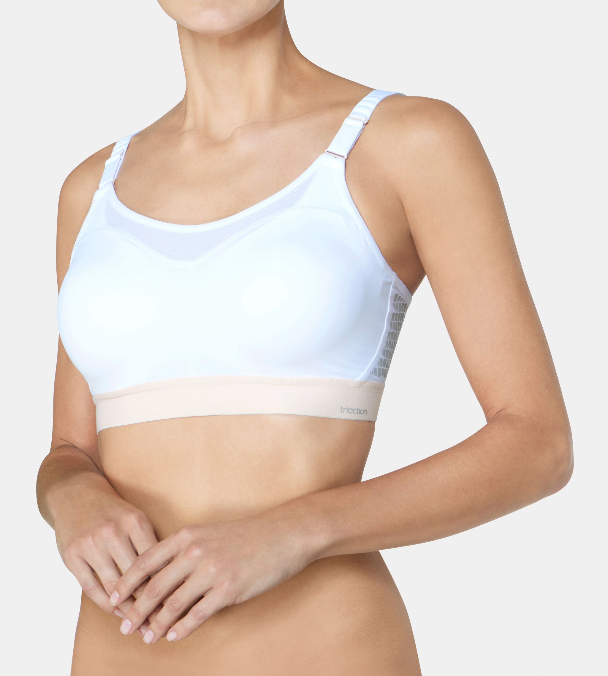 Triumph - Our multi-purpose Triaction Control Lite sports bra has straps  that perfectly adapt to your shape for great hold. #Triaction  #TriumphLingerie